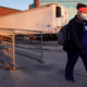 Nurse Jessica Franz walks past a mobile morgue at Olathe Medical Center on Nov. 26, 2020, in Olathe, Kansas.